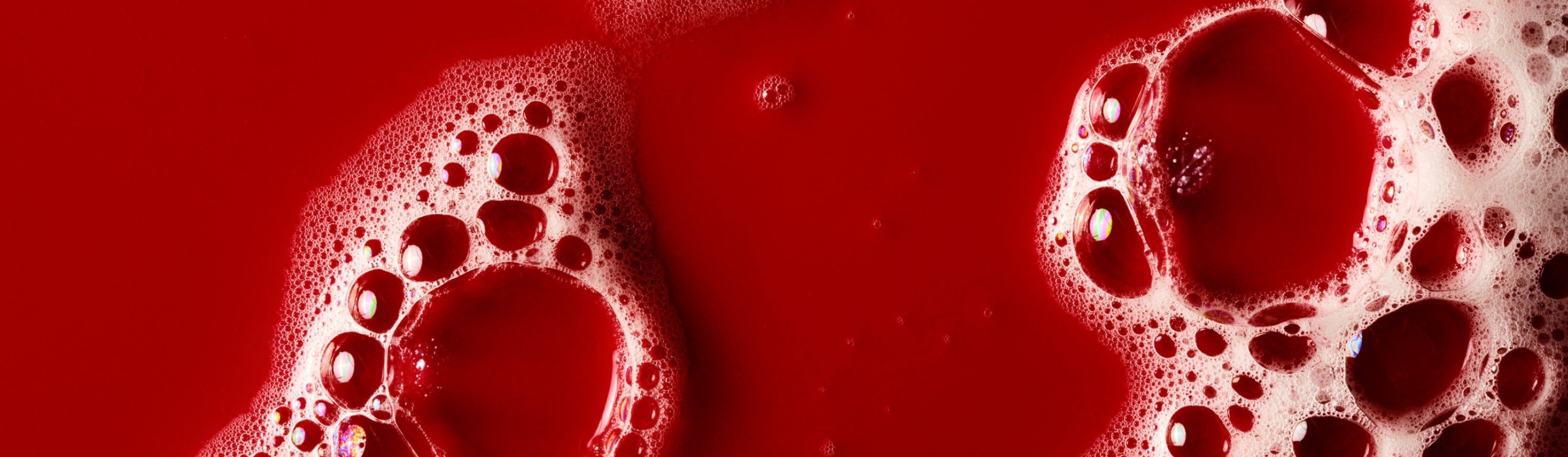 Suds on a red background