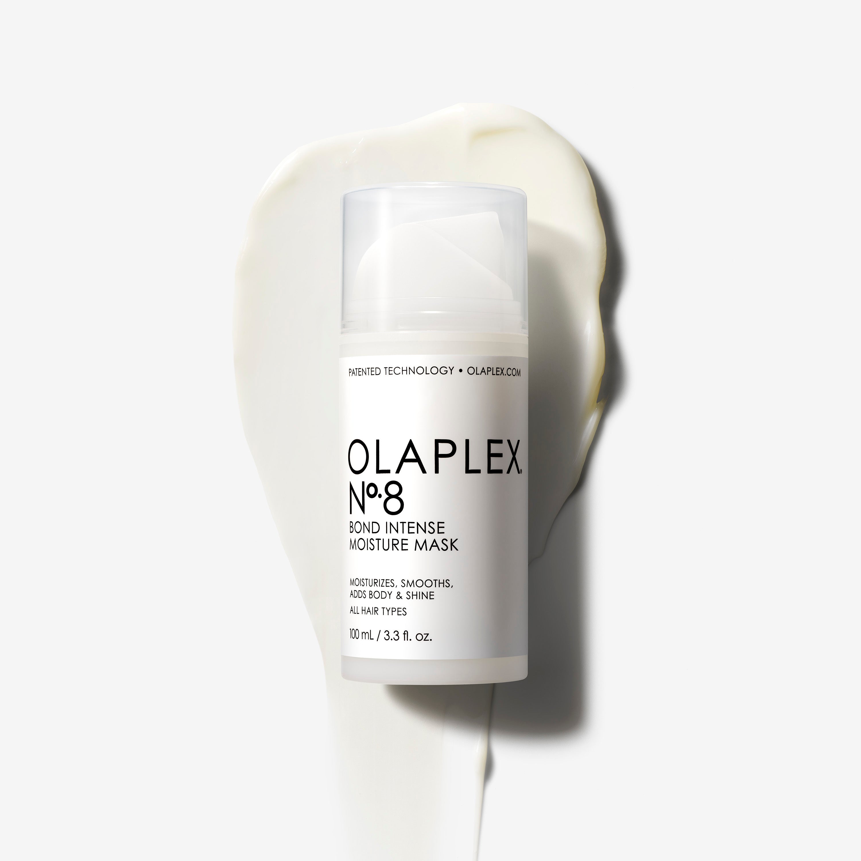 A bottle of OLAPLEX No.8 Bond Intense Moisture Mask on a white surface