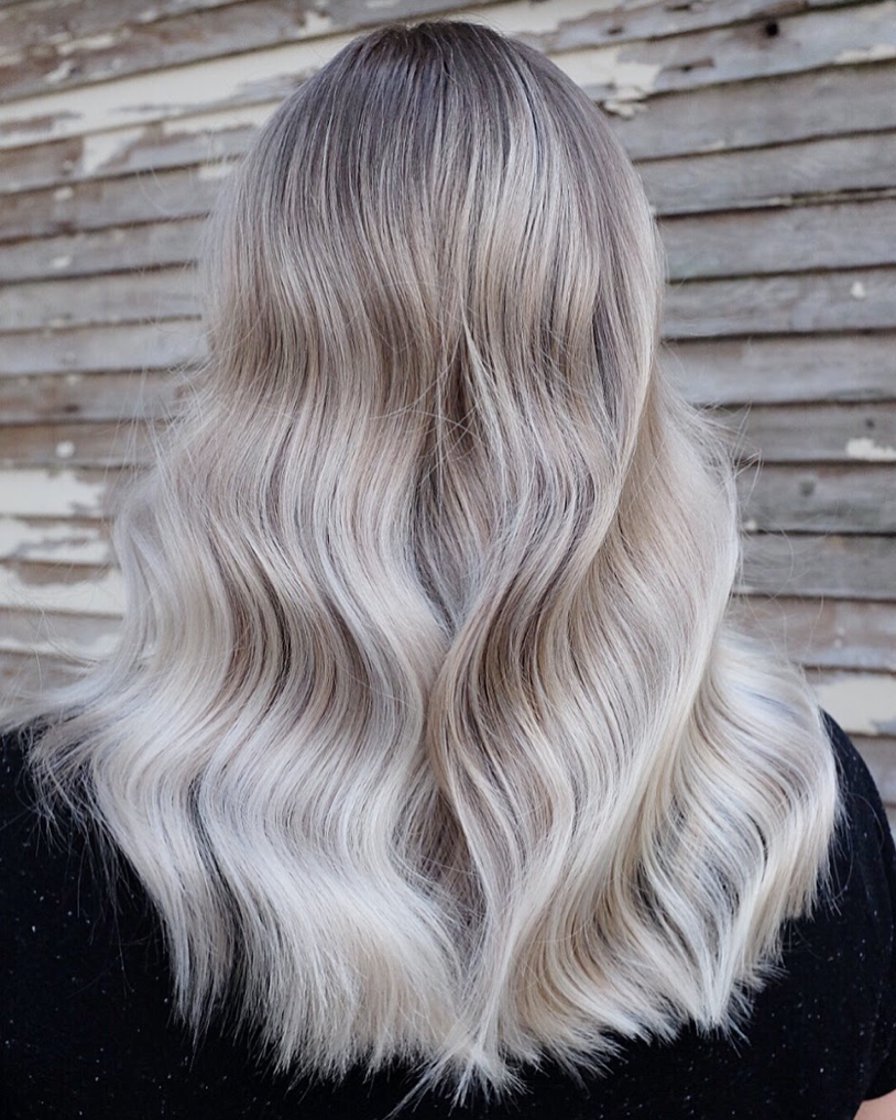 A shot of a woman’s light, platinum blonde hair from behind