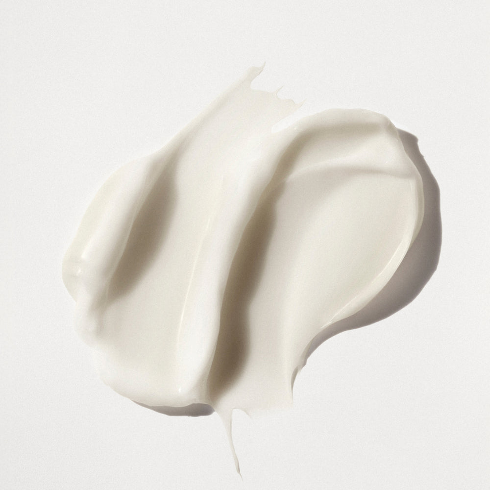hover 

A thick, creamy white swatch of OLAPLEX Nº.5CURL Hydrating Curl Conditioner showing a smooth, rich texture on a light gray background. - alternate view