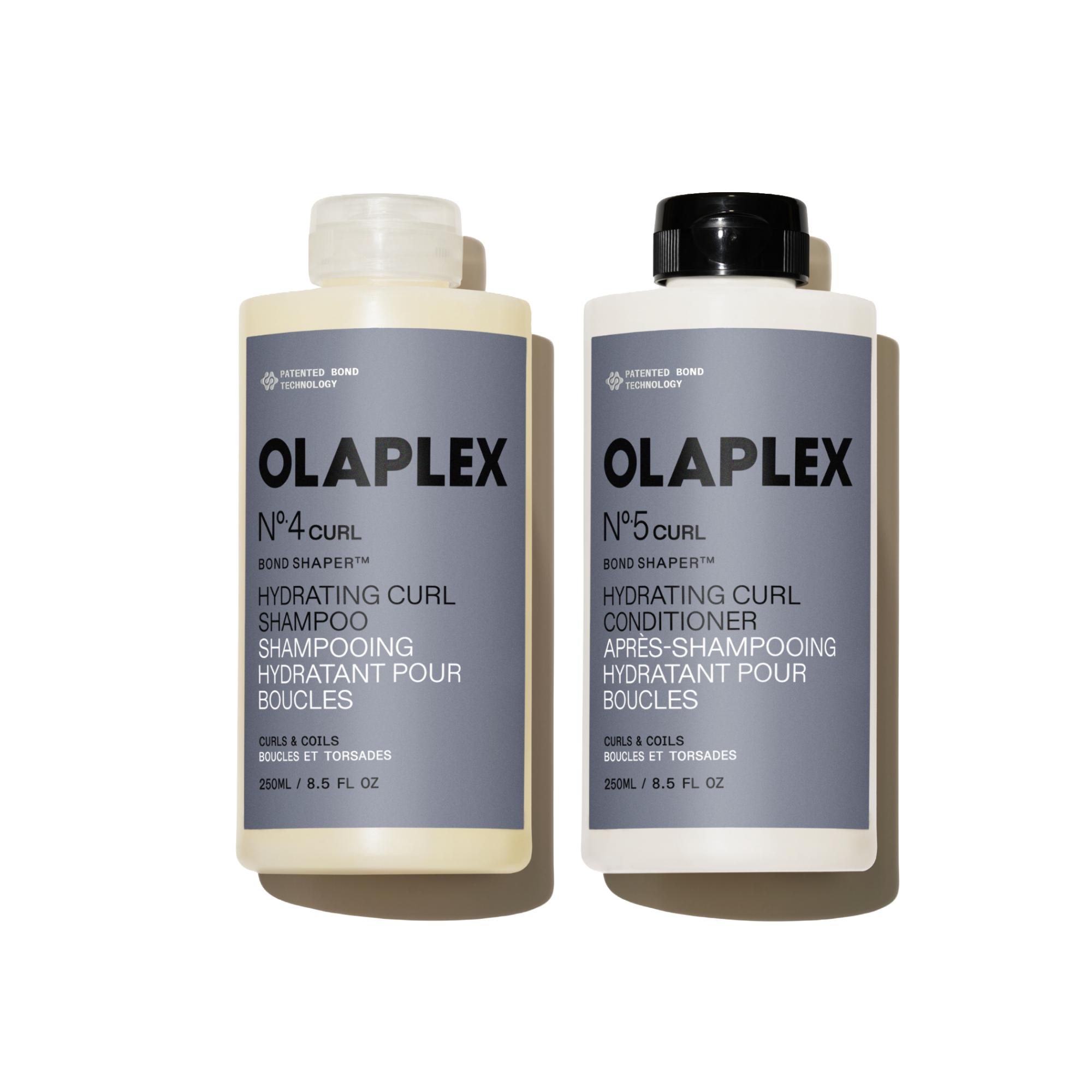 OLAPLEX Nº.4CURL Hydrating Curl Shampoo and Nº.5CURL Hydrating Curl Conditioner 250ML duo on a transparent background.